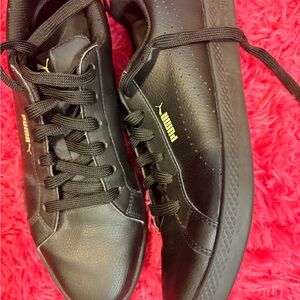 Puma black and gold